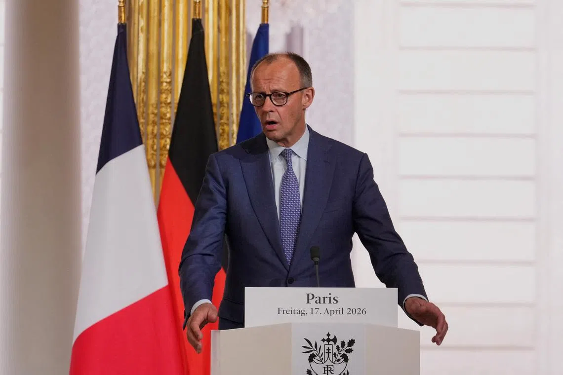 FILE PHOTO: German Chancellor Friedrich Merz gives a statement at the end of an international summit to push forward efforts to reopen the Strait of Hormuz, at the Elysee Palace, in Paris, France, Friday, April 17, 2026.   Michel Euler/Pool via REUTERS/File Photo
