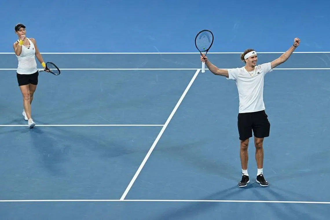 Tennis - United Cup - Ken Rosewall Arena, Sydney, Australia - January 5, 2024 Germany's Alexander Zverev and Laura Siegemund celebrate after winning their mixed double quarterfinal match against Greece's Maria Sakkari and Petros Tsitsipas REUTERS/Jaimi Joy