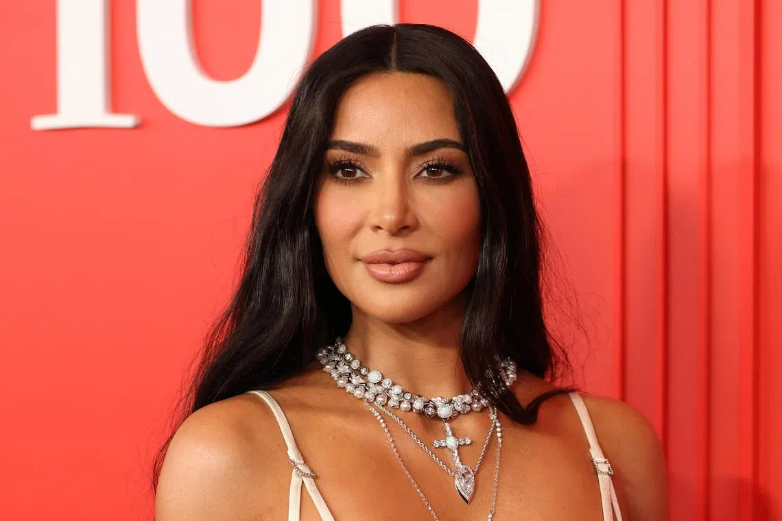 Kim Kardashian is accused of scamming investors in EMAX crypto by falsely hyping the digital tokens.
