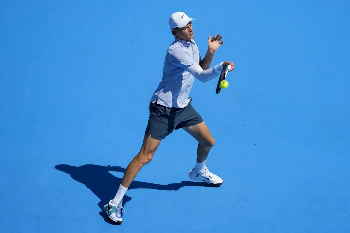 FILE PHOTO: Aug 18, 2025; Cincinnati, OH, USA;  Jannik Sinner (ITA) returns a shot against Carlos Alcaraz (ESP) during the Cincinnati Open at the Lindner Family Tennis Center. Mandatory Credit: Aaron Doster-Imagn Images/File Photo