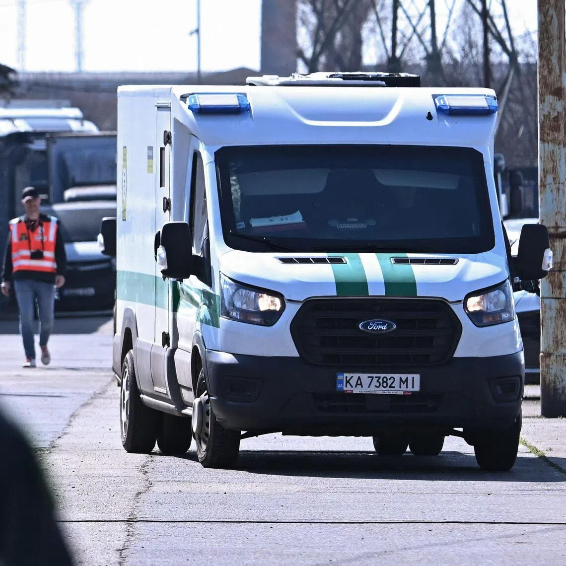 Officials from Hungary's National Tax and Customs Administration returning one of two Ukrainian armoured cash transport vehicles to the State Savings Bank of Ukraine, in Budapest, on March 12.