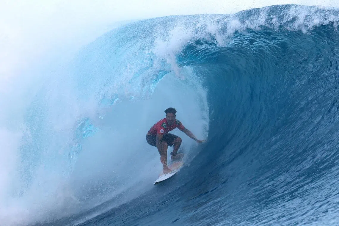 FILE PHOTO: Surfing - World Surf League - Tahiti Pro - Teahupo'o, Tahiti, French Polynesia - May 30, 2024  Brazil's Italo Ferreira in action during the final REUTERS/Thomas Bevilacqua/File Photo