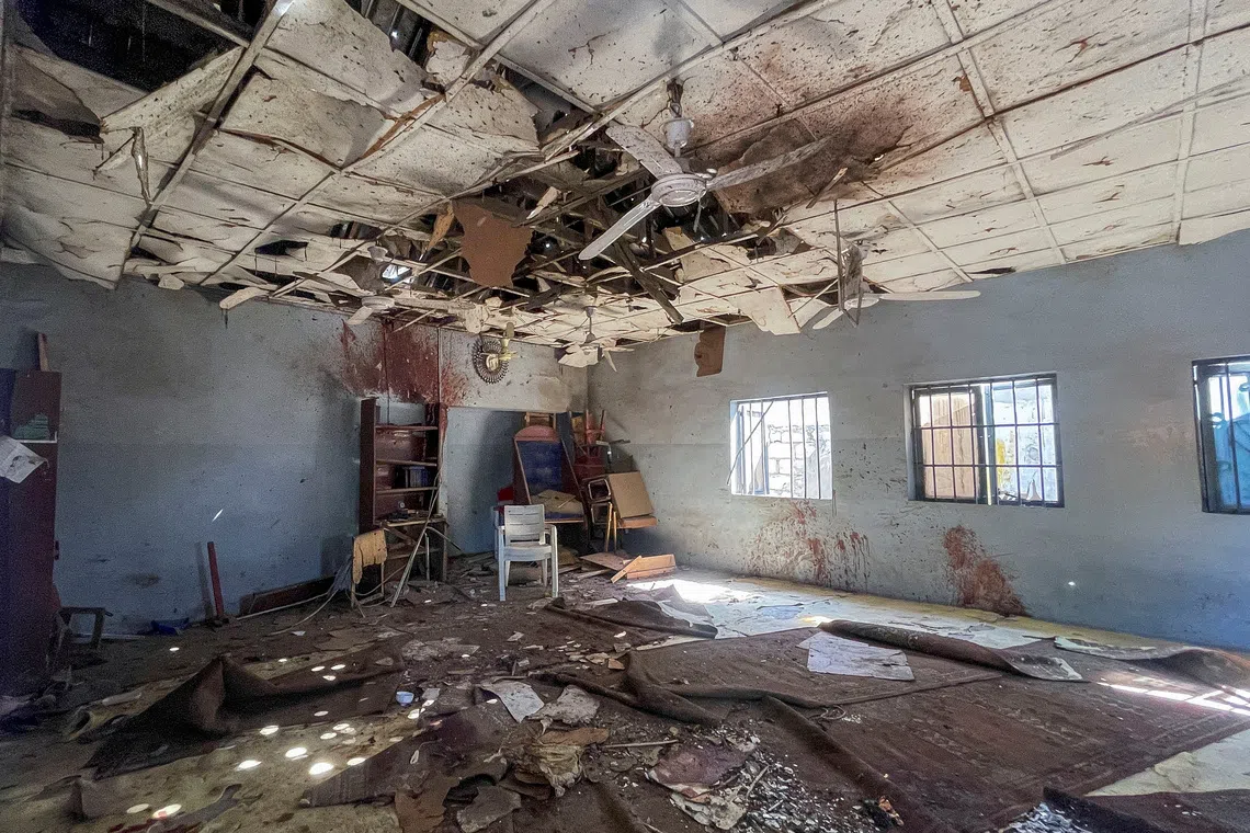 Remnants are seen inside the Al-Adum Jumaat Mosque a day after an explosion that struck the mosque following evening prayers near Gamboru Market in Maiduguri, Borno State, Nigeria, December 25, 2025. REUTERS/Ahmed Kingimi