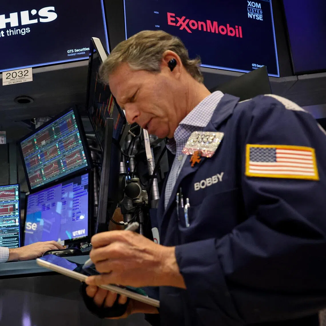 Traders working on the floor of the New York Stock Exchange, in New York City, on Nov 25.