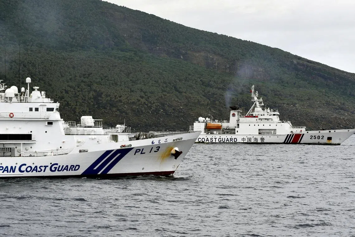 China and Japan have given contradictory versions of a confrontation around the disputed Senkaku Islands on Dec 2.