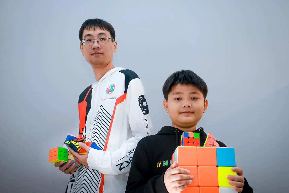 Luis Tan (right) and Wong Chong Wen met at Cubewerkz Cubing Academy in April. 