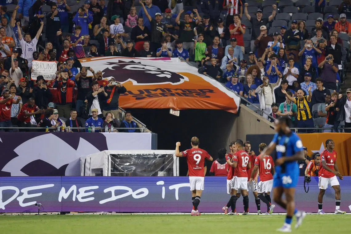 Manchester United forward Rasmus Hojlund celebrates scoring his team's first goal during the Premier League Summer Series football match against Bournemouth at Soldier Field in Chicago, Illinois.