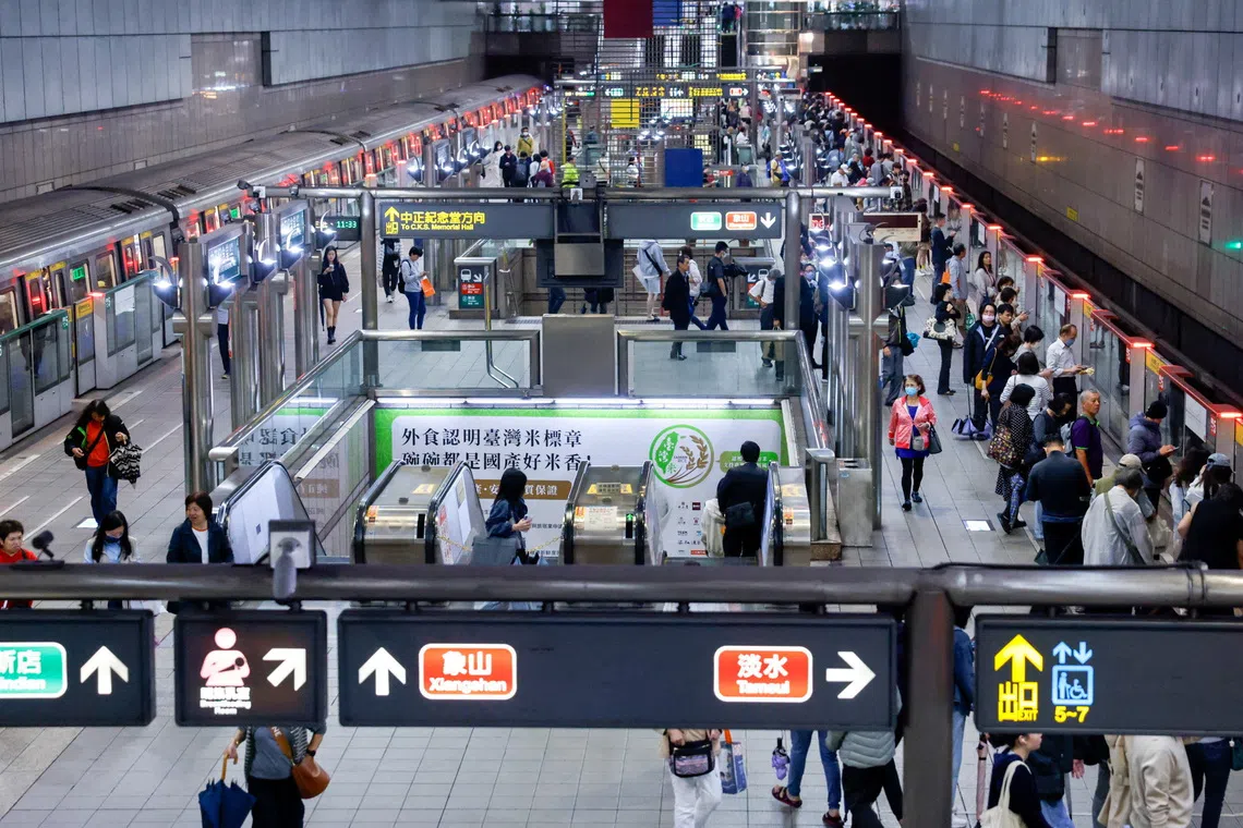 Commuters at a metro station in Taipei on Nov 11. A Chinese national used business or tourism as pretexts to visit Taiwan multiple times, the Taiwan High Prosecutors Office said.