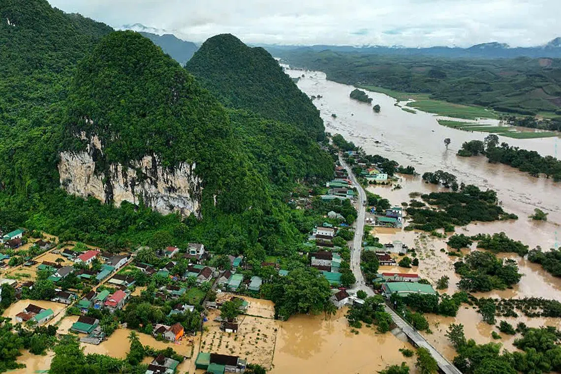 A village in Vietnam's north-central Nghe An province was flooded on July 23.