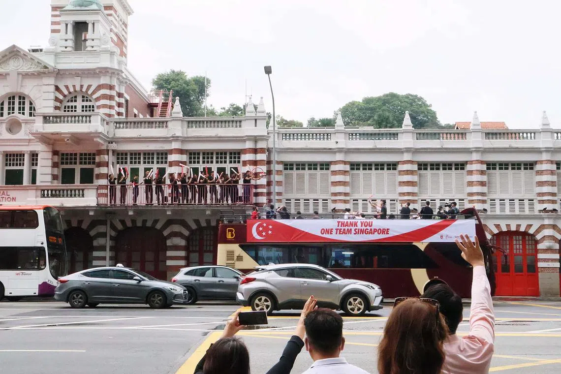 dgbus14 Photo taken during the One Team Singapore celebratory parade passing by Central Fire Station on Aug 14, 2024. Ten athletes are Max Maeder, Olympic bronze medallist for sailing ; sailor Ryan lo; badminton mixed doubles pair Terry Hee and Jessica Tan; women's singles badminton player Yeo Jia Min; swimmer Gan Ching Hwee; kayaker Stephenie Chen; table tennis players Izaac Quek and Zhou Jingyi; and Athletics Marc Brian Louis