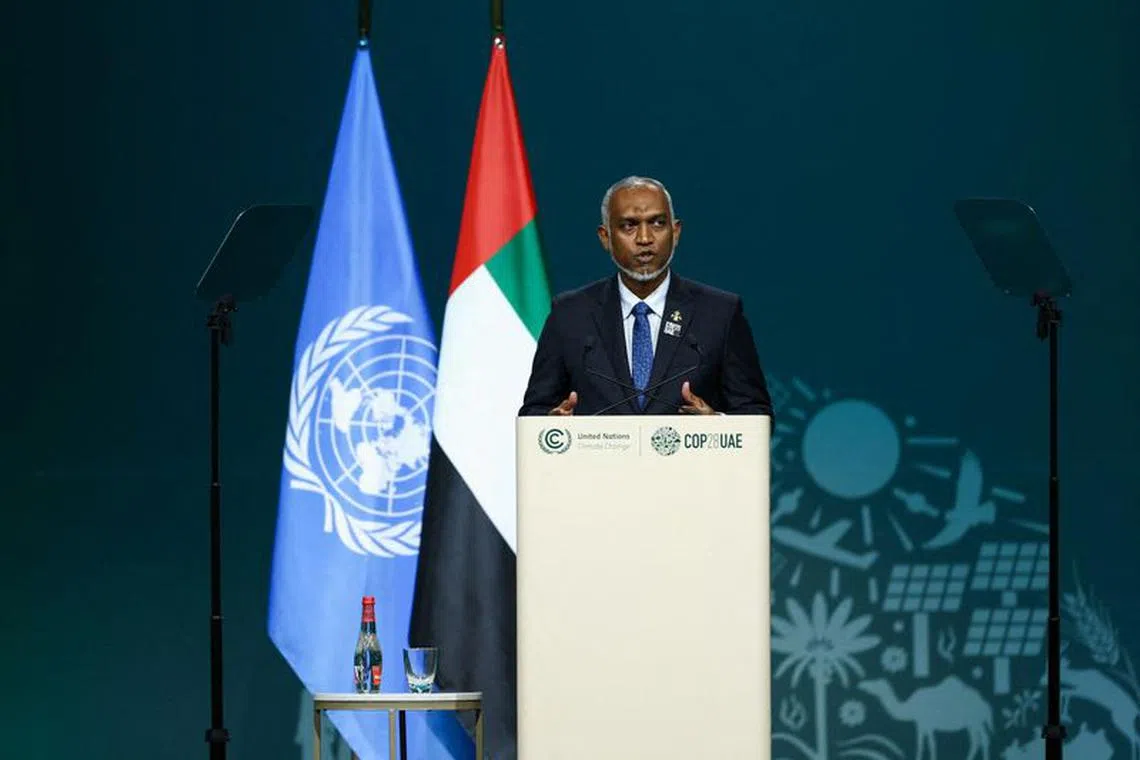 FILE PHOTO: President of the Maldives Mohamed Muizzu delivers a national statement at the World Climate Action Summit during the United Nations Climate Change Conference (COP28) in Dubai, United Arab Emirates, December 1, 2023. REUTERS/Amr Alfiky