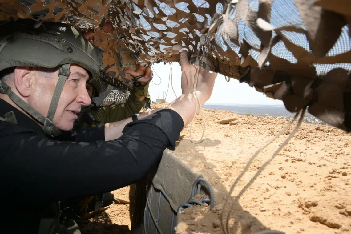 Israeli Prime Minister Benjamin Netanyahu visiting an Israeli military outpost near the Yellow Line in the Gaza Strip.