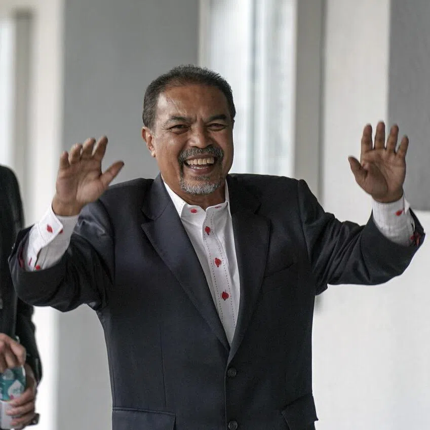 Jamil Khir Baharom (right) pleaded not guilty to the charges on Sept 14.