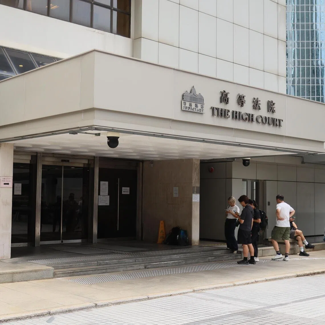 Members of the media wait outside the High Court during the murder trial over the 2023 killing of Hong Kong model and socialite Abby Choi, in Hong Kong, on Sept 21.