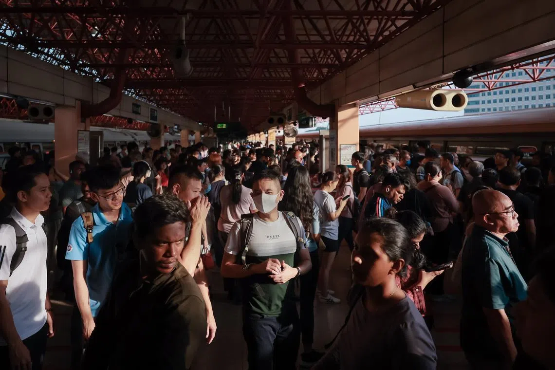Commuters waiting for the shuttle train service to Boon Lay MRT Station at Jurong East MRT Station at 6pm on Sept 25, 2024.