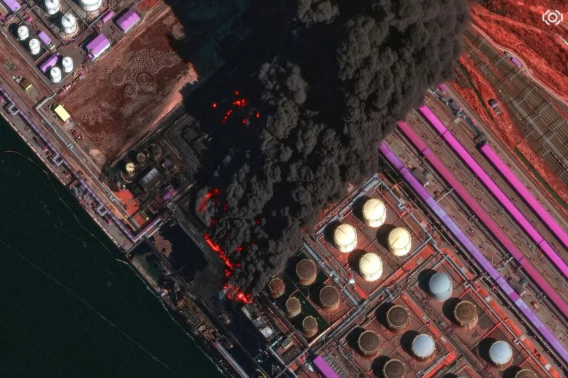 FILE PHOTO: A satellite near-infrared image shows smoke rising from Russia's Baltic port of Ust-Luga after a Ukrainian attack, in Ust-Luga, Leningrad Oblast, March 27, 2026. Vantor/Handout via REUTERS/File Photo