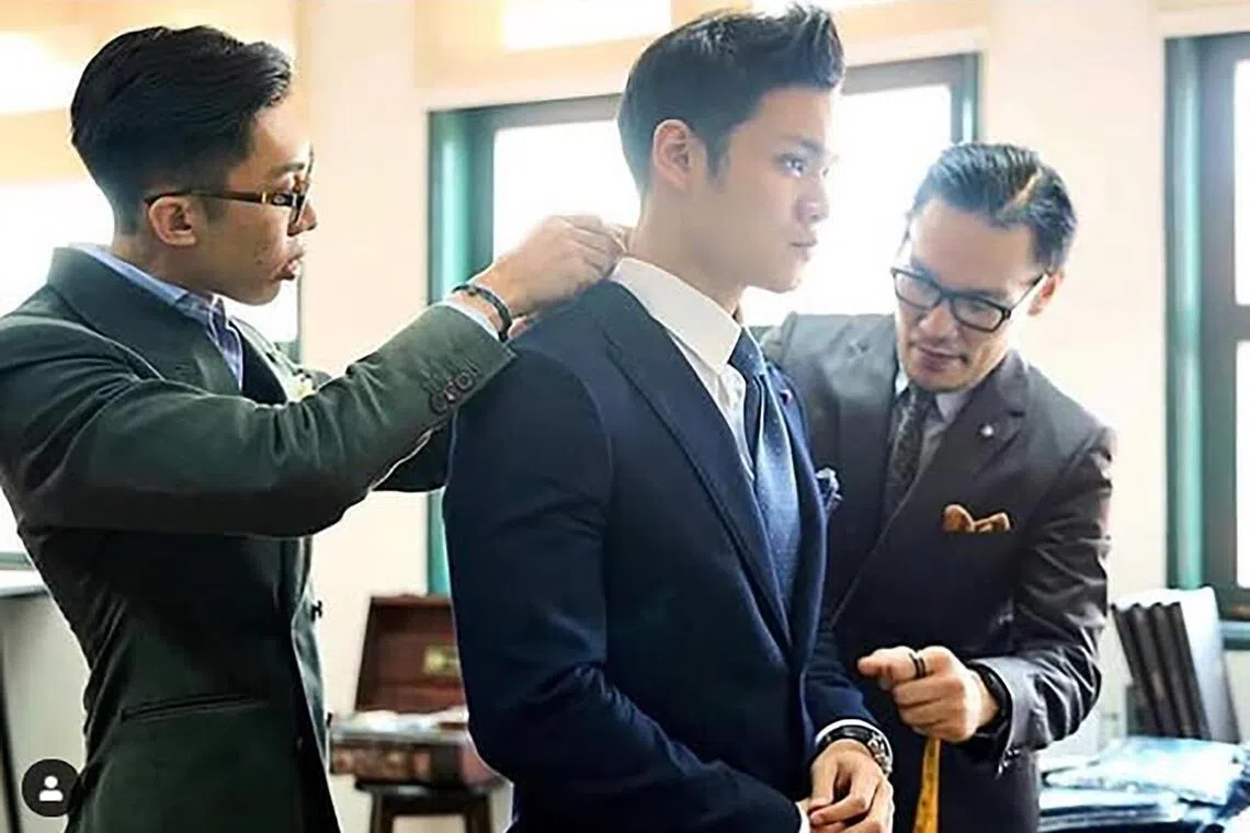 Hertslet & Co co-founder Cai Foong (left) attending to a client. 