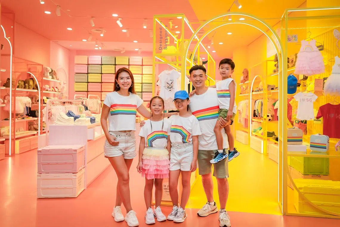 Le Petit Society founders Dylan Ong and Robyn Liang with their children Rylee, 11, Skyler, 9, and Kyle, 6, at their store in Jewel Changi Airport on July 31, 2024.