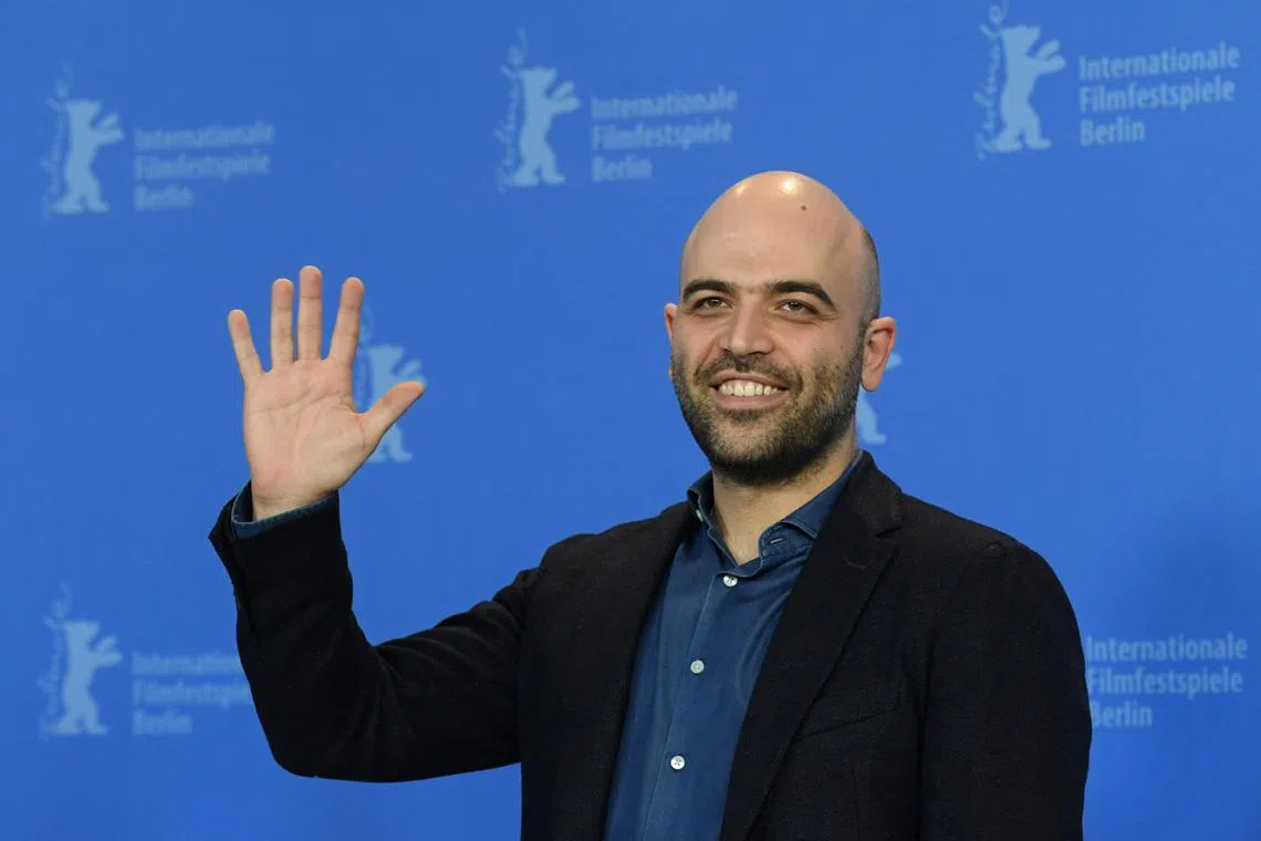 FILE PHOTO: Screenwriter and author Roberto Saviano poses during a photocall to promote the movie \"La Paranza dei Bambini\" (Piranhas) at the 69th Berlinale International Film Festival in Berlin, Germany, February 12, 2019. REUTERS/Annegret Hilse/File Photo