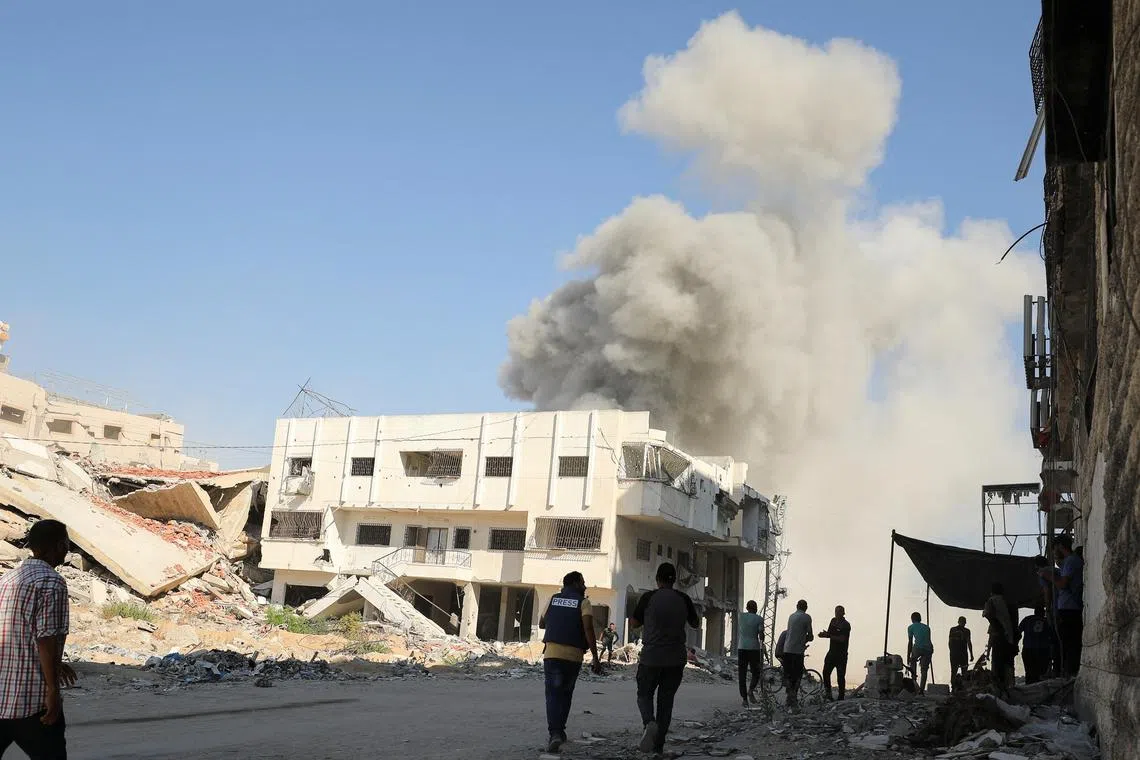 Smoke rises following an Israeli strike, amid the Israel-Hamas conflict, in Gaza City, August 21, 2024. REUTERS/Dawoud Abu Alkas