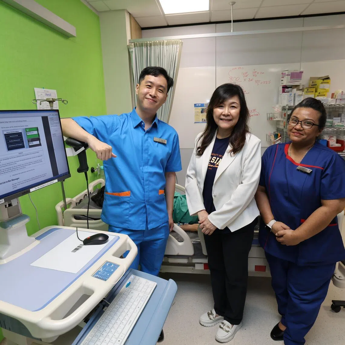 (L-R) Alexandra Hospital senior staff nurse Leo Wong, Associate Professor Lydia Lau, deputy head of undergraduate education at the Alice Lee Centre for Nursing Studies under NUS Medicine,  and Ms Theresa Samy, assistant director of nursing for nursing informatics at the National University Hospital. NUS Medicine is launching a concurrent degree programme that combines the existing Bachelor of Science in Nursing honours programme and the Master of Science in Biomedical Informatics.