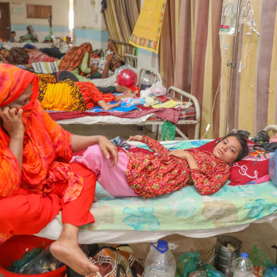 Children receiving treatment after showing measles-like symptoms at Mugda Medical College Hospital in Dhaka, Bangladesh, on July 28.
