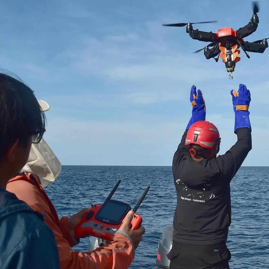 lcwhale23 - Researchers piloting a drone carrying a satellite tag during their Marine Migratory Species Expedition in 2025.
Credit: HO/Doc.Konservasi Indonesia