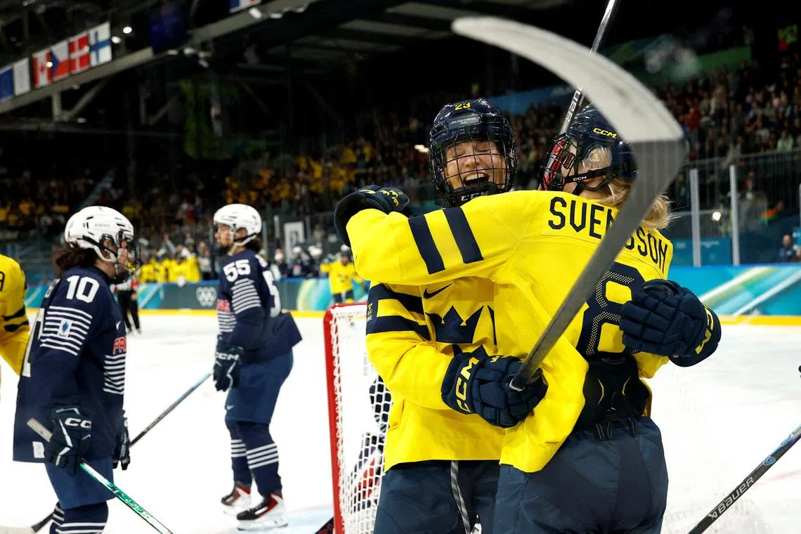 Milano Cortina 2026 Olympics - Ice Hockey - Women's Preliminary Round - Group B - France vs Sweden - Milano Rho Ice Hockey Arena, Milan, Italy - February 08, 2026. Thea Johansson of Sweden celebrates scoring their first goal with Hilda Svensson of Sweden IMAGN IMAGES via Reuters/Geoff Burke