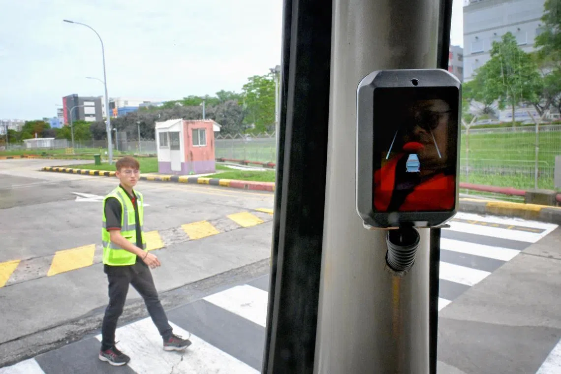 ST20240524_202408562517/tnbus24/Shintaro Tay/Taryn Ng/

A demonstration of the AGIL DriveSafe  on a bus approaching a commuter at the Bedok North Depot on May 24, 2024. 

Through cameras installed around the bus exteriors, the AGIL DriveSafe  can detect vehicles and road users in blind spots to minimise the risk of collisions.