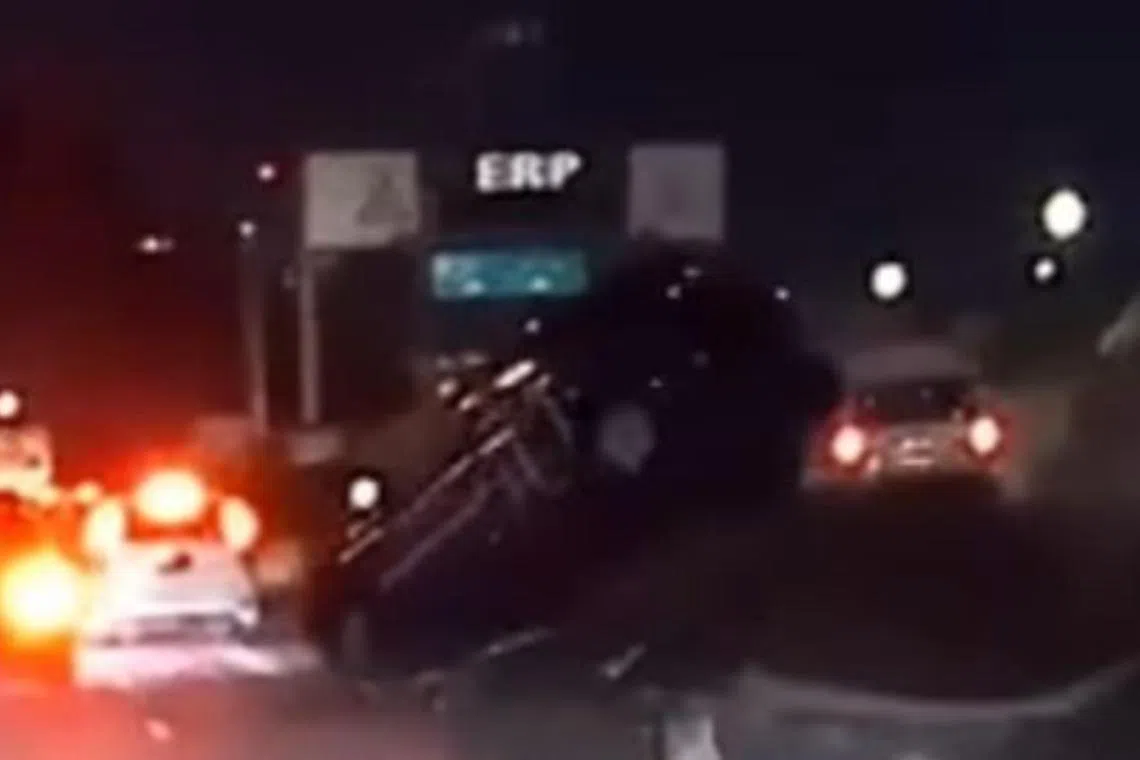 The car is seen in a video travelling on a road when it hits the divider before ending up on another slip road.