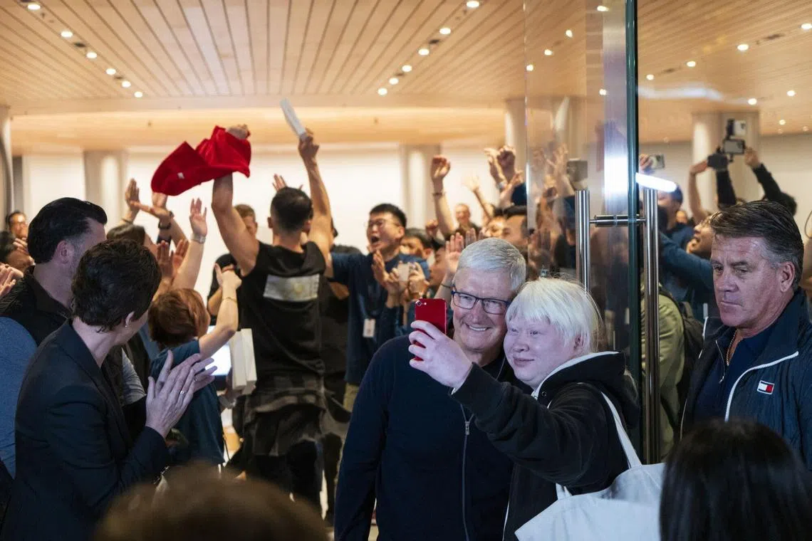 CEO Tim Cook himself opened Apple's 57th store in China, its second-largest after its Fifth Avenue outlet.