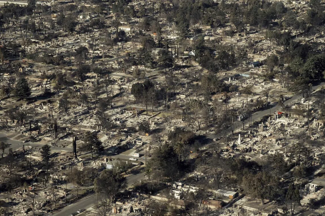 An aerial view of homes destroyed by the Eaton Fire in a neighbourhood of Altadena, California on Jan 14.