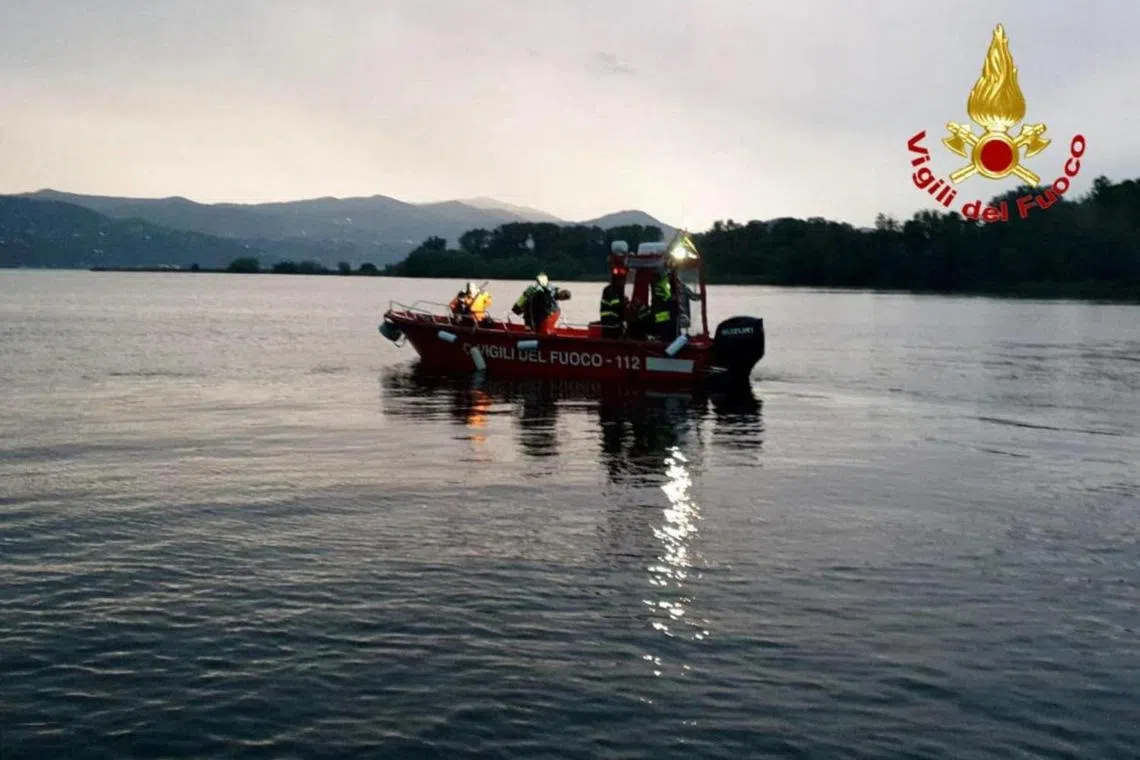 The recovery operation after the boat overturned on Italy's Lake Maggiore, resulting in four dead.