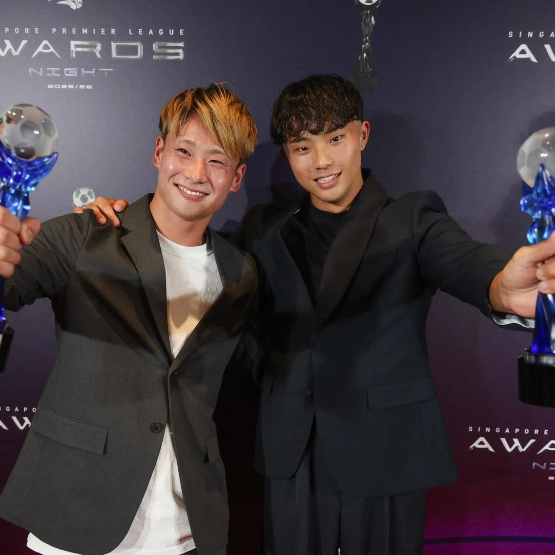 SPL Player of the Year Hide Higashikawa (left) and Young Player of the Year Shingo Nakano at the SPL Awards Night at Raffles City Convention Centre on May 22.