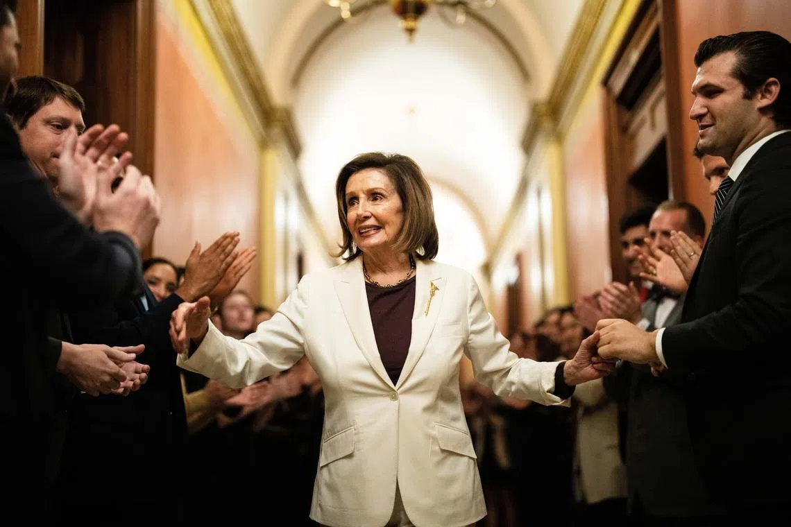 FILE Ñ Rep. Nancy Pelosi (D-Calif.) is applauded by her staff after announcing that she would be stepping down as speaker of the House in Washington on Nov. 17, 2022. A new book by Pelosi details her clashes with former President Donald Trump, but it was written before her most recent exercise of political might: helping persuade President Joe Biden to end his reelection bid.  (Erin Schaff/The New York Times)