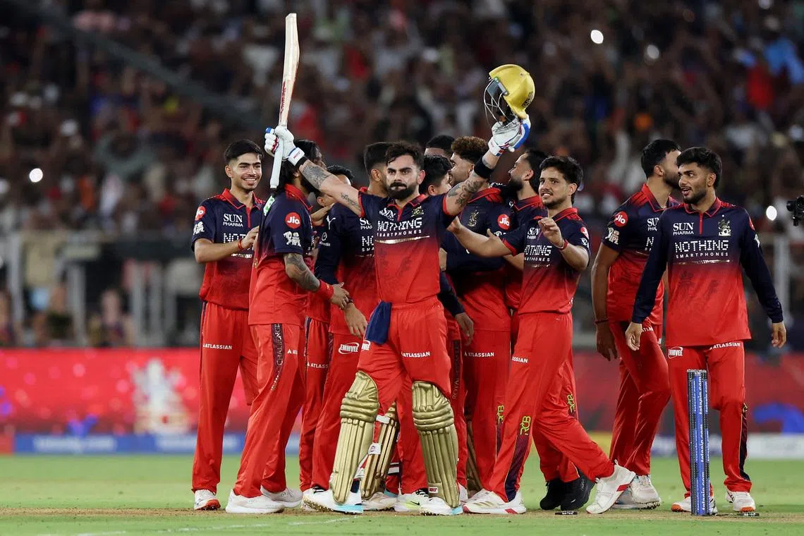 Cricket - Indian Premier League - IPL - Final - Royal Challengers Bengaluru v Gujarat Titans - Narendra Modi Stadium, Ahmedabad, India - May 31, 2026 Royal Challengers Bengaluru's Virat Kohli and teammates celebrate winning the Indian Premier League REUTERS/Amit Dave