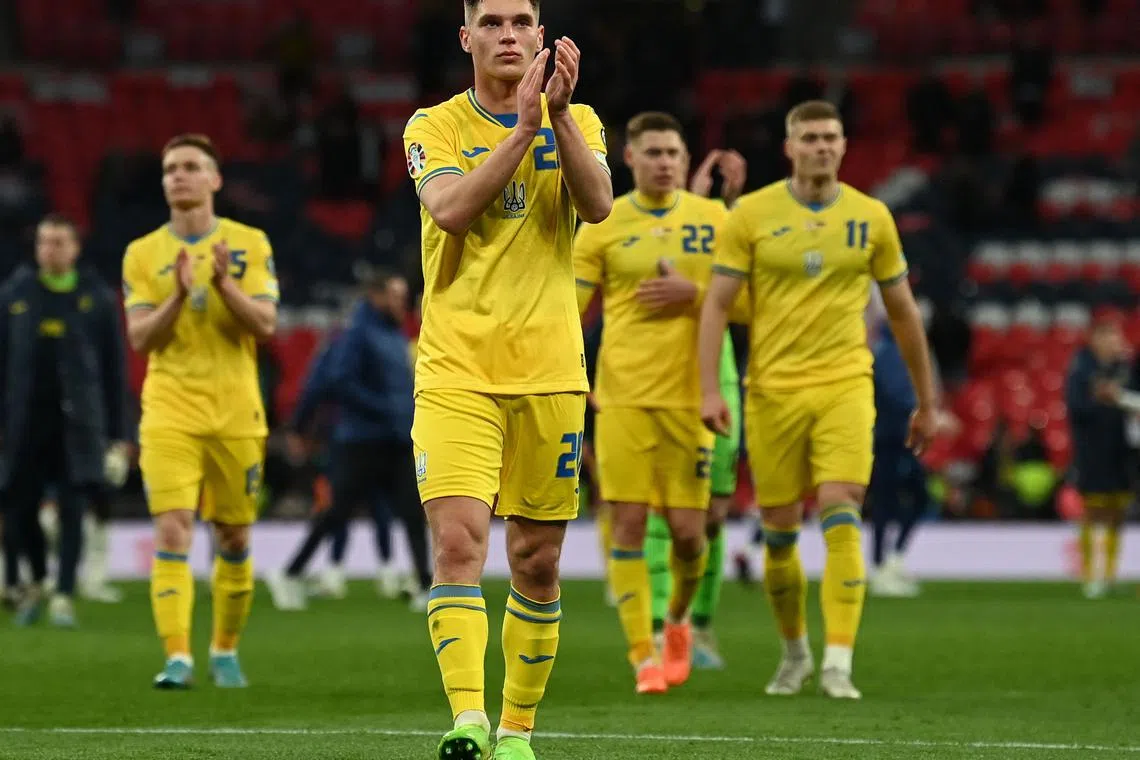 Ukraine's Georgiy Sudakov reacts after during the UEFA Euro 2024 group C qualification football match.