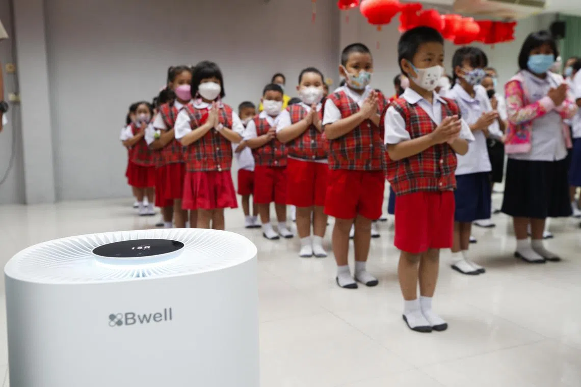 epa11872052 Thai kindergarteners wearing face masks perform Buddhist daily chanting inside a room equipped with an air purifier as they are prevented from outdoor activities due to unhealthy levels of particle air pollution, at Wat Rajaphatikaram school in Bangkok, Thailand, 03 February 2025. The Wat Rajaphatikaram school provides dust-free classrooms equipped with air purifiers and air ventilation systems, and sealed classrooms for kindergarteners and elementary students as part of dust-prevention measures amid the ongoing hazardous PM2.5 air pollution. In around 1,966 classrooms across 429 schools, 744 of the classrooms have been upgraded to an air conditioned room and many are now equipped with air purifiers as part of the Bangkok Metropolitan Administration's Dust-Free classroom project, in an effort to cope with the fine particulates matter (PM2.5) which caused the air pollution to escalate to levels harmful to health, according to Bangkok Governor Chadchart Sittipunt. The estimated 13.6 million children in Thailand are at risk of being highly exposed to PM2.5 air pollution, according to UNICEF's Over the Tipping Point report.  EPA-EFE/RUNGROJ YONGRIT