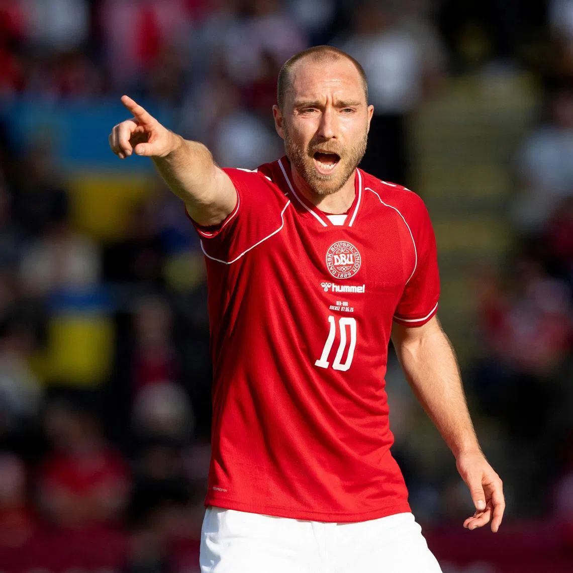 Denmark's Christian Eriksen during the match against Ukraine before he later collapsed on the pitch in the Danish city of Odense.