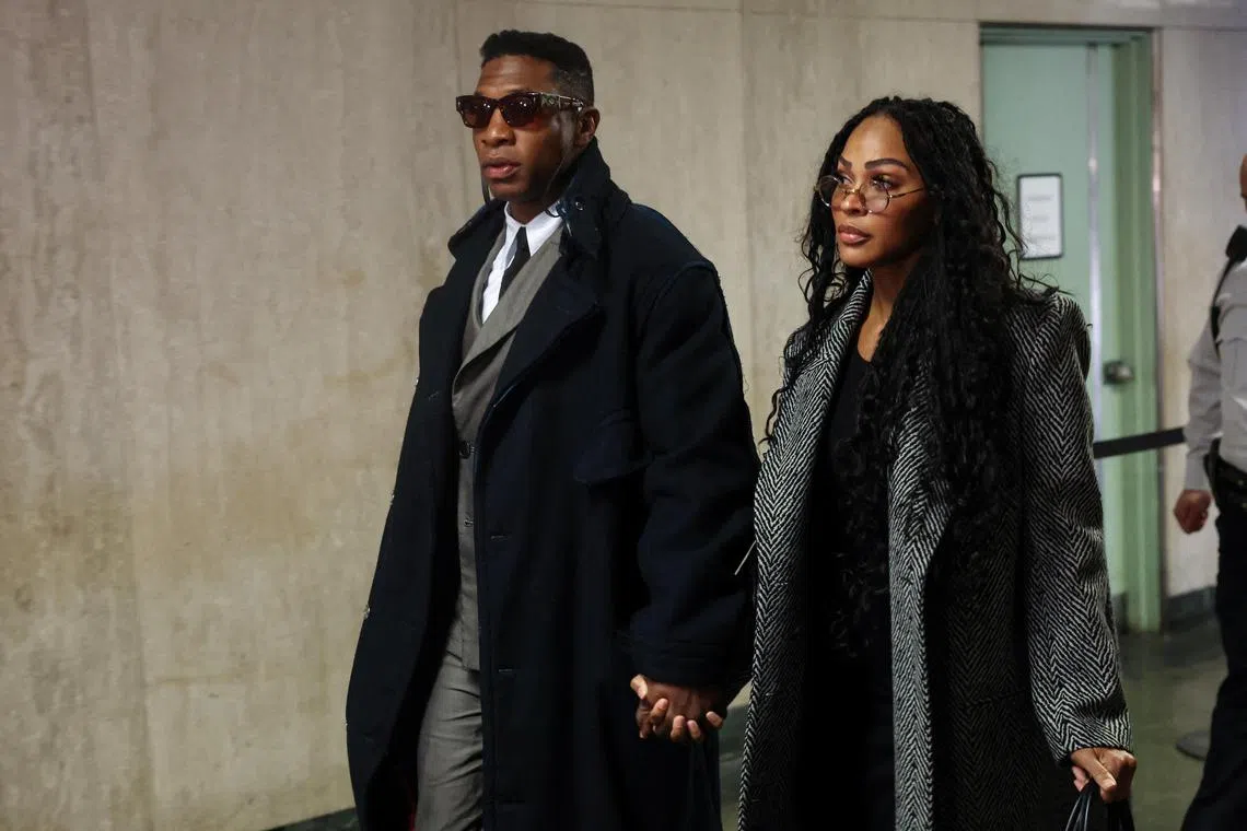 Actor Jonathan Majors arrives with girlfriend Meagan Good for the jury selection in his assault and harassment case at Manhattan Criminal Court in New York City on Nov 29, 2023. 