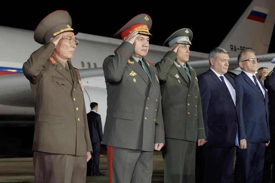 epa10768439 Russian Defence Minister Sergei Shoigu (2-L) attends a ceremony of the official meeting of the Russian delegation with the participation of the guard of honor of the Korean People's Army, at the Sunan International Airport in Pyongyang, North Korea, 25 July 2023.  EPA-EFE/RUSSIAN DEFENCE MINISTRY PRESS SERVICE  / HANDOUT MANDATORY CREDIT HANDOUT EDITORIAL USE ONLY/NO SALES
