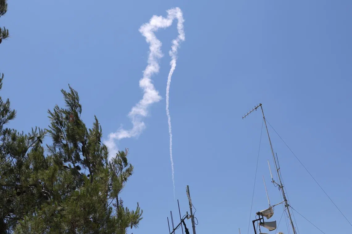 Israel strikes Beirut southern suburbs after Hezbollah launc