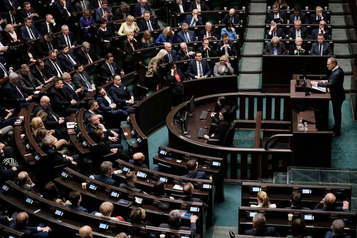 Newly appointed Polish Prime Minister Donald Tusk presents his government's programme and asks for a vote of confidence in Parliament in Warsaw, Poland December 12, 2023. Slawomir Kaminski/Agencja Wyborcza.pl via REUTERS/File Photo