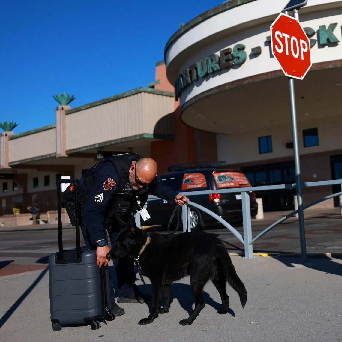 A K9 police dog named Brita sniffing a suitcase at El Paso International Airport, after the US Federal Aviation Administration lifted its temporary closure of the airspace over El Paso on Feb 11. The Trump administration had earlier said that Mexican cartel drones around the US-Mexico border had forced the airport to shut down temporarily.