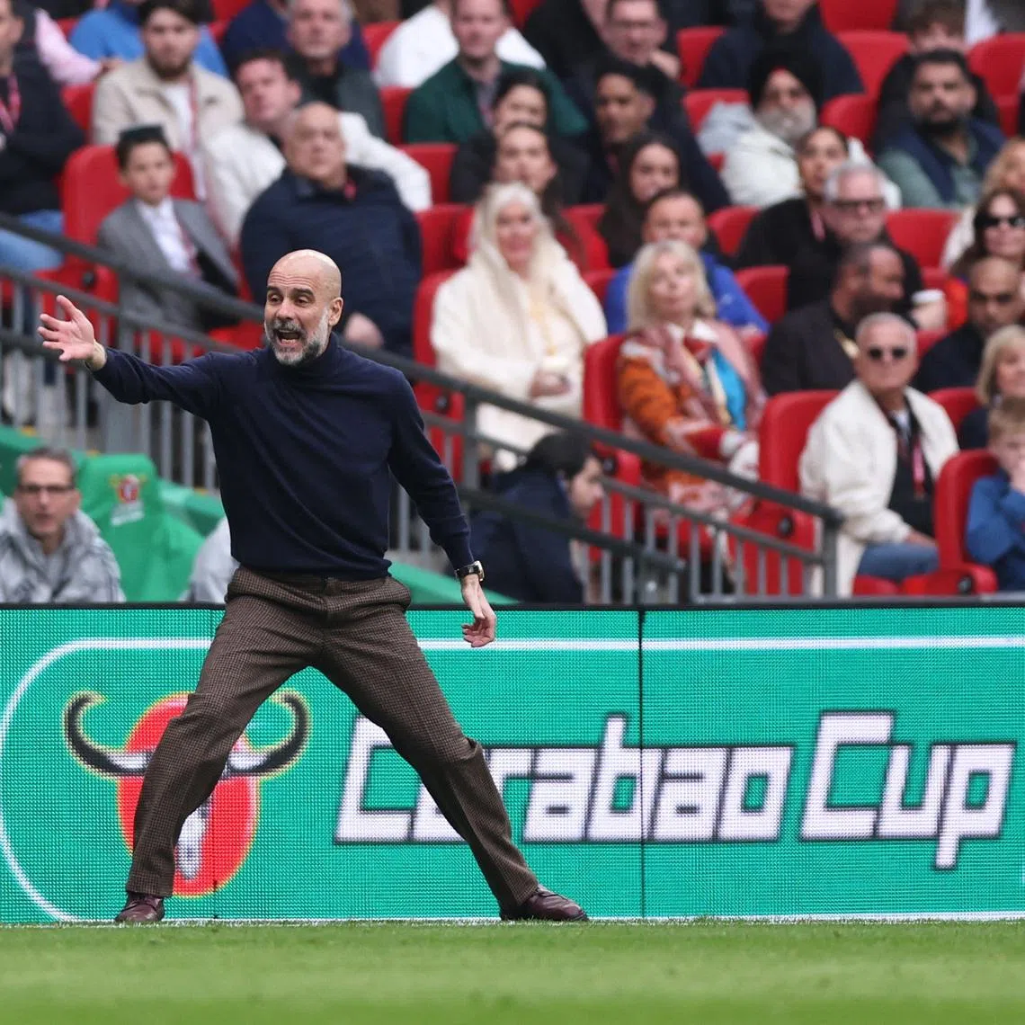Soccer Football - Carabao Cup - Final - Arsenal v Manchester City - Wembley Stadium, London, Britain - March 22, 2026 Manchester City manager Pep Guardiola reacts REUTERS/David Klein EDITORIAL USE ONLY. NO USE WITH UNAUTHORIZED AUDIO, VIDEO, DATA, FIXTURE LISTS, CLUB/LEAGUE LOGOS OR 'LIVE' SERVICES. ONLINE IN-MATCH USE LIMITED TO 120 IMAGES, NO VIDEO EMULATION. NO USE IN BETTING, GAMES OR SINGLE CLUB/LEAGUE/PLAYER PUBLICATIONS. PLEASE CONTACT YOUR ACCOUNT REPRESENTATIVE FOR FURTHER DETAILS..
