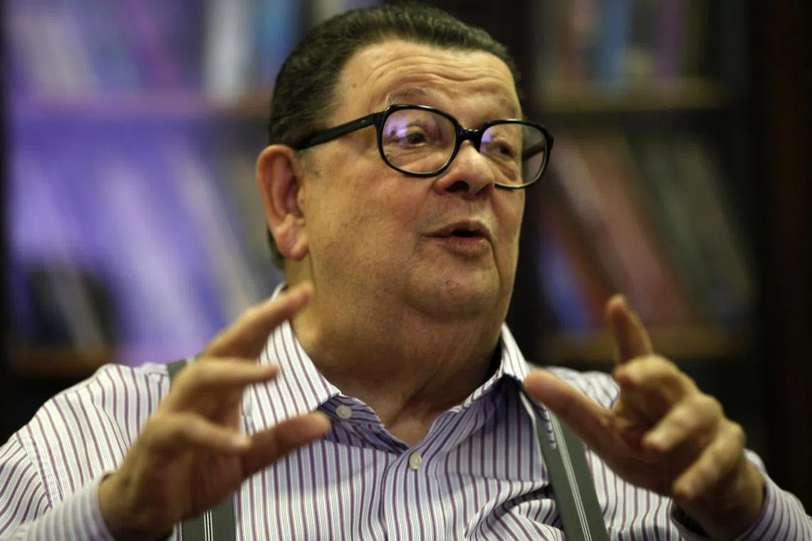 Brazil's former Finance and Planning Minister Antonio Delfim Netto gestures as he attends an interview with Reuters in Sao Paulo July 15, 2013. REUTERS/Paulo Whitaker/File Photo