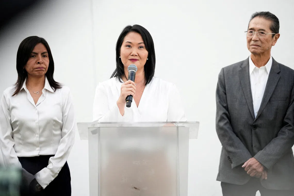 FILE PHOTO: Keiko Fujimori, leader of the Fuerza Popular (Popular Force) political party, attends a press conference with her lawyer Giulliana Loza after a judge dismissed the \"Cocteles\" (Cocktails) case against Fujimori, in Lima, Peru, October 20, 2025. REUTERS/Angela Ponce/File Photo