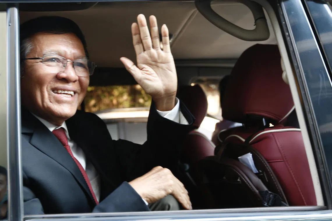 Kem Sokha, former leader of the opposition Cambodia National Rescue Party, arrives to attend a hearing at the Municipal Court in Phnom Penh on Friday. 