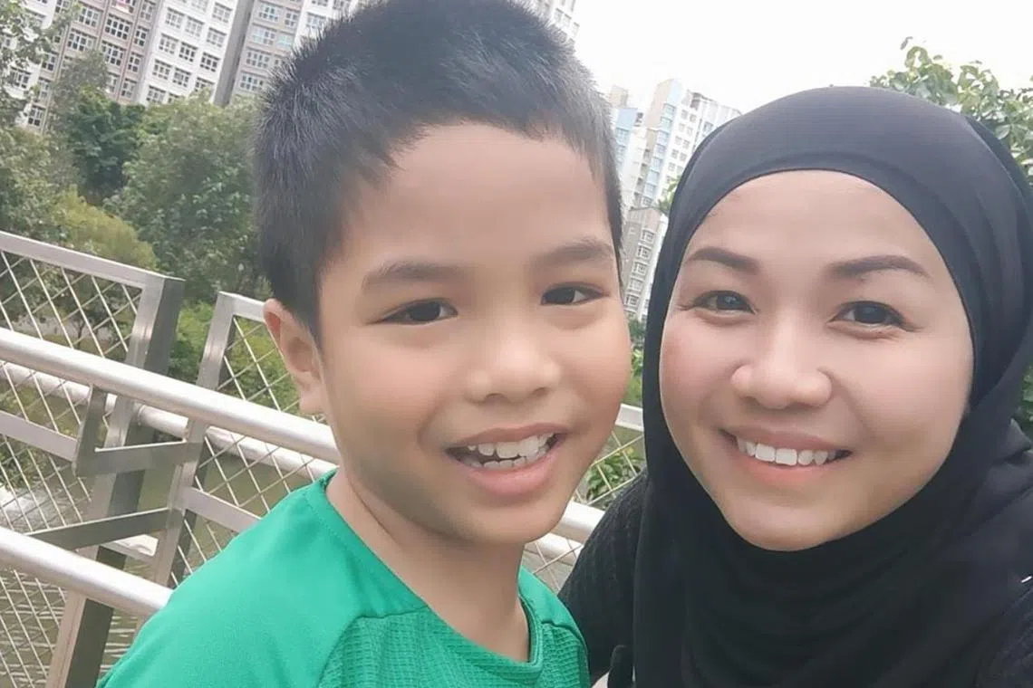 Madam Safirah Oshin and her son Ali who has autism. 
