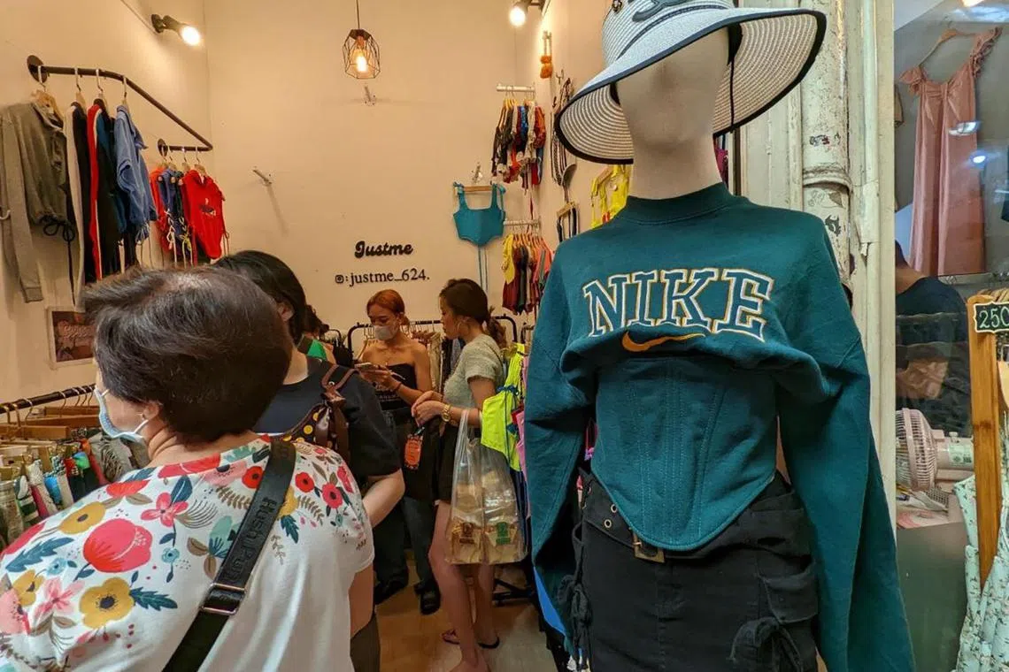 Since Just Me opened at Chatuchak Market in Bangkok last year, more foreign tourists have been purchasing upcycled cropped tops, corsets and sweaters from the clothing store.  